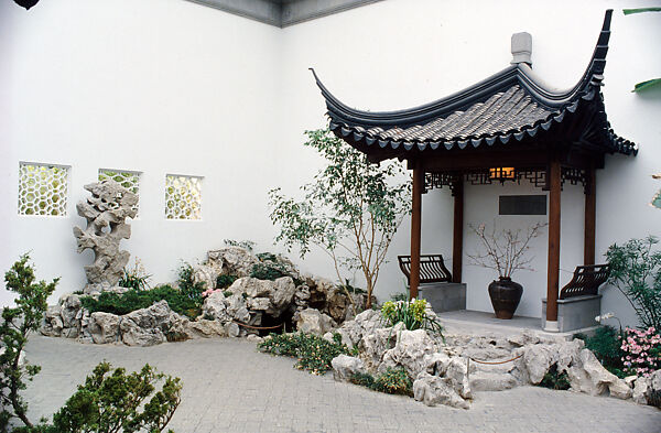 The Astor Chinese Garden Court, Taihu rocks, granite terrace, ceramic tile flooring, roof tiles, and door frames,  various woods (nan wood columns, pine beams, gingko latticework), brass fittings, China